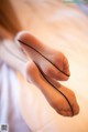 A close up of a person's foot with a black line on it.